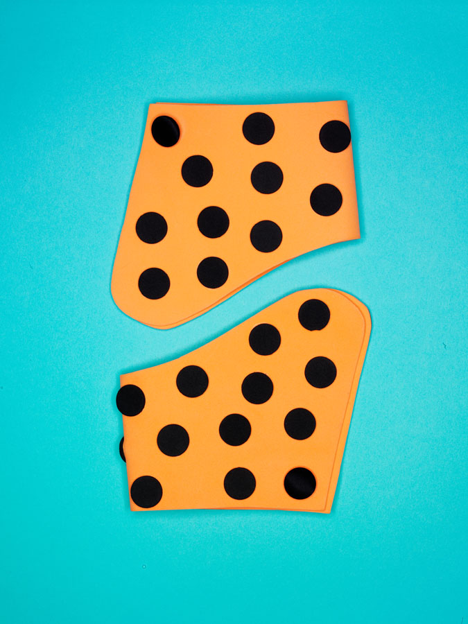 Geoffrey Beene cuffs with polka-dot appliqué.