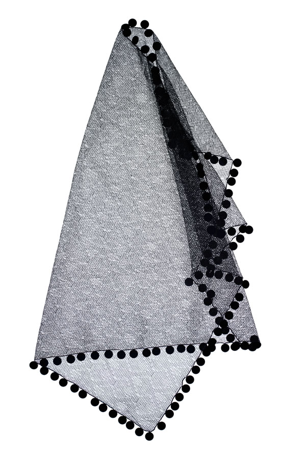 Geoffrey Beene black net scraf trimmed with black pailettes.
