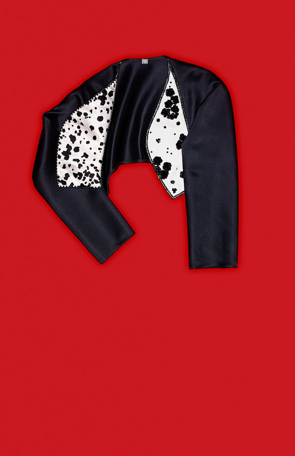 Geoffrey Beene black satin bolero with sequin and print detail.