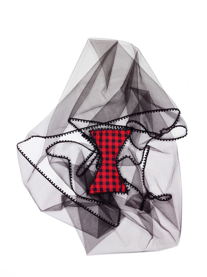Geoffrey Beene black tulle shawl with piqot trim and appliqué of faille gingham.