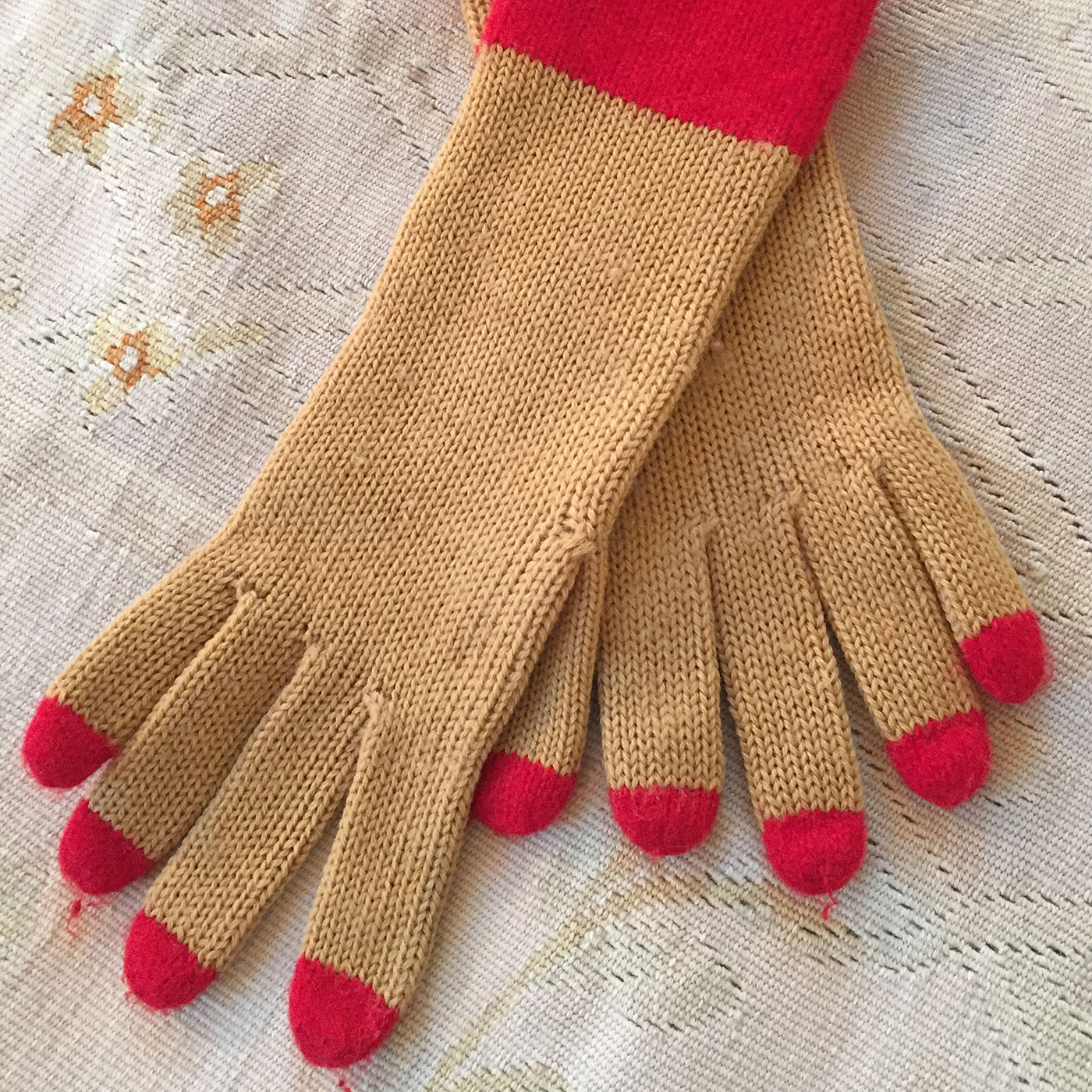 Geoffrey Beene spring wool gloves with red nail detail.